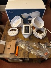 Used Ring Floodlight Cam Wired Pro + Ring Plug-In Mount for Floodlight Cams