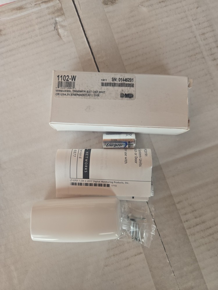 DMP 1102-W Universal Wireless Transmitter White CR123A Battery Included