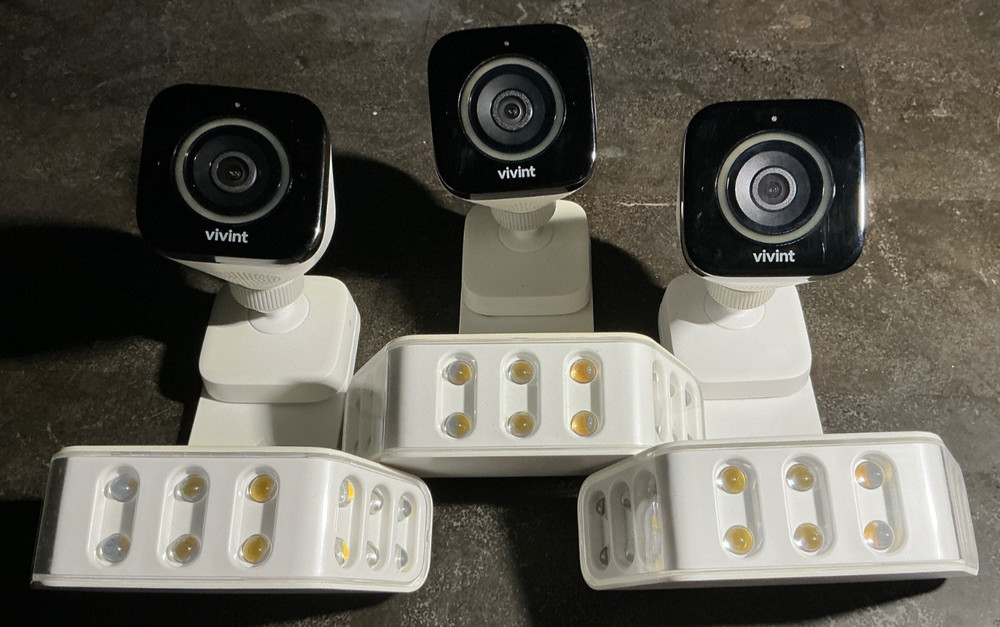 vivinit cameras with attached lights can talk back and forth